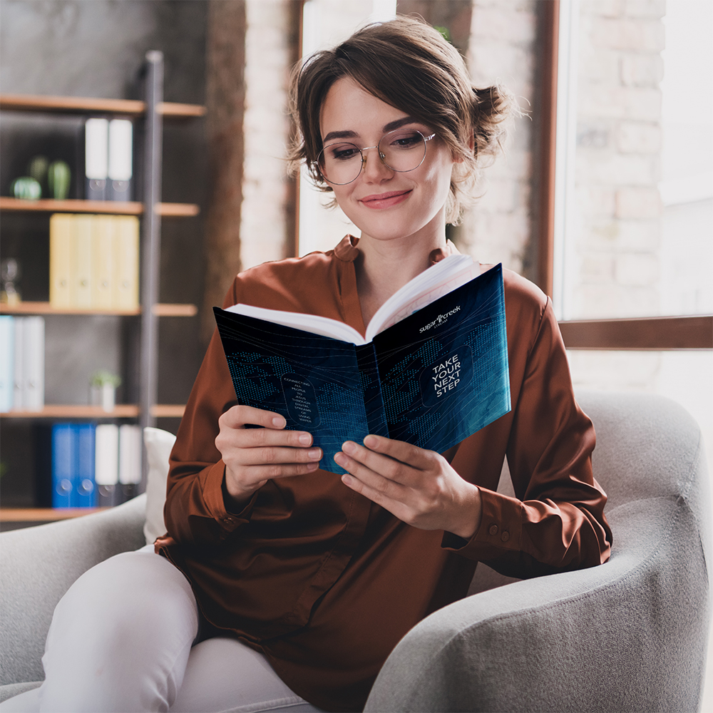 Woman Reading Next Step Book